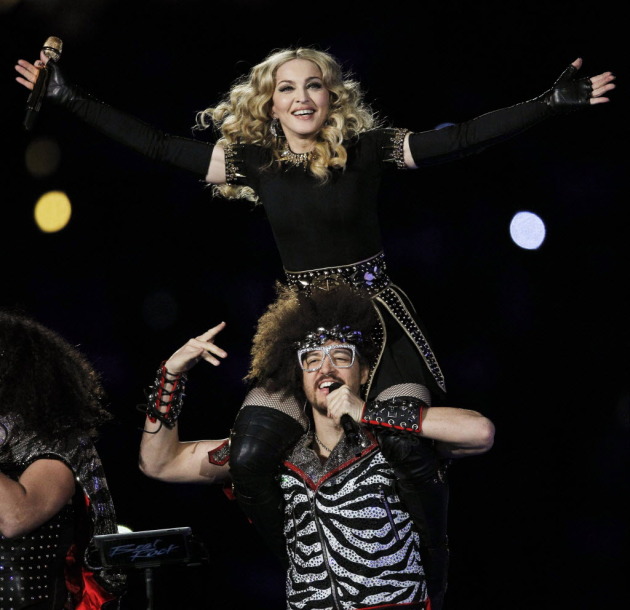 Madonna gets a Super Bowl ride from Redfoo of LMFAO Associated Press photo